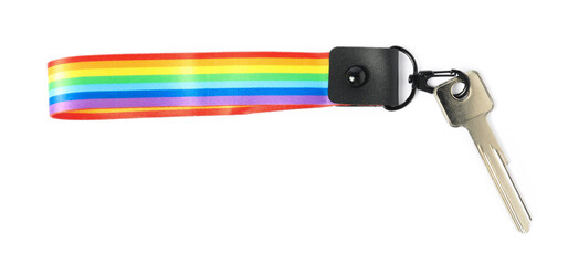 Key with keychain in LGBT colors on white background, top view
