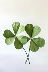 Handmade green shamrock decoration. Cut from paper, creating a charming St. Patrick's Day themed display.