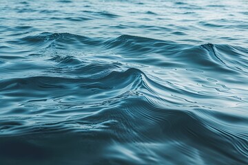 Serene Blue Ocean Surface with Gentle Waves and Crystal Clear Water
