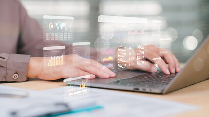 Analyzing Data in a Digital Workspace, Person interacts with laptop displaying advanced analytics...