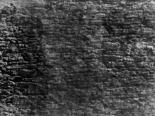 Abstract grunge background desing with textured Black stone concerete wall