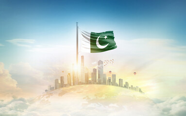 Pakistan flag wavering on globe with modern building skyline. Flag waving on world map. Pakistan...