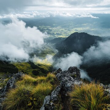 Majestic mountain landscape with rolling clouds