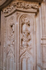 Intricate stone carving on historical facade.