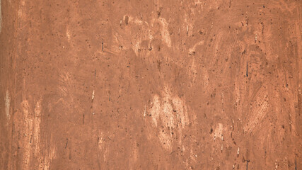 brown background, in the photo a concrete wall painted brown