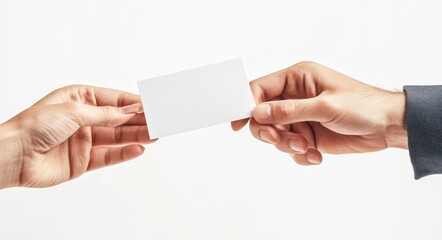 Obraz premium Close-up of hands exchanging business cards, simple and elegant white backdrop