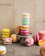 A variety of different macarons. A variety of colors and flavors of French almond dessert