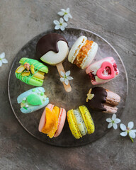 A variety of different macarons. A variety of colors and flavors of French almond dessert