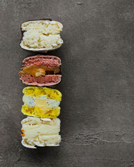 A variety of different macarons. A variety of colors and flavors of French almond dessert
