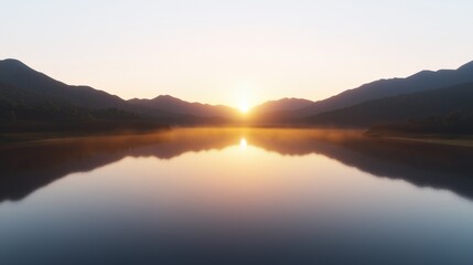 Fototapeta premium A serene sunrise reflecting on a tranquil lake surrounded by mountains.