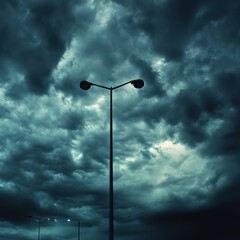 A street light is lit up in the dark sky