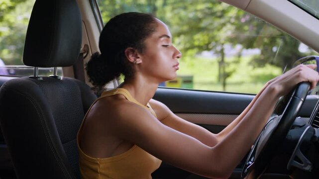 Stressed African American woman female car drive auto lean on steering wheel pain traffic accident problem automobile city tired girl despair lady businesswoman vehicle transportation business trouble