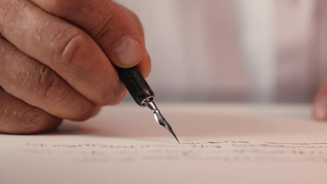 Close up hand old man elderly male pensioner write writing writer paper document paperwork business businessman worker financial contract letter fountain pen to do list author text handwriting signing