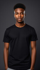 Obraz premium young man in black shirt t shirt tshirt mock up vertical view