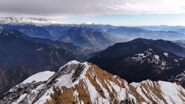 Aerial view of a stunning Nandadevi, Kedar, and Chaukhamba. landscape with snow-capped peaks