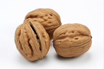 Two Brown Walnuts on White Background - Natural Nut with Shells for Food and Snacks