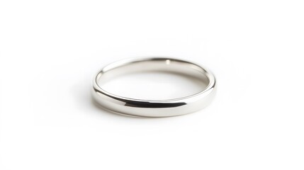 A silver wedding ring, isolated against a pure white background
