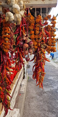 Garlic, onions, chilis, peppers and other colourful spices on a market in Tbilisi, Georgia.