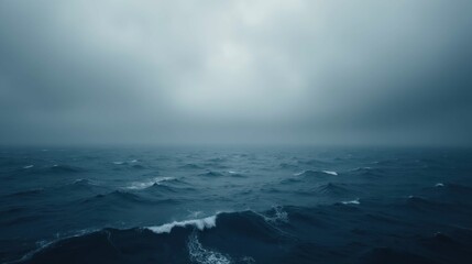 Obraz premium Tranquil Ocean Scene with Dark Stormy Clouds and Gentle Waves
