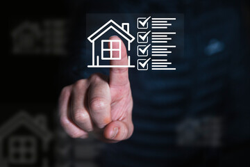 A person touches a digital housing checklist icon, symbolizing real estate, property management,...