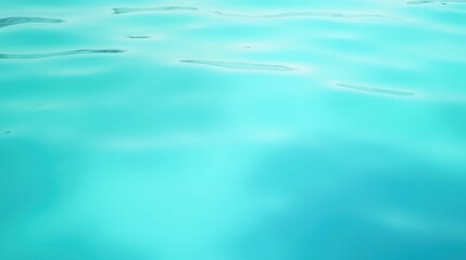 Tranquil Turquoise Water Surface with Gentle Ripples and Light Reflection