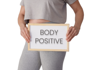 Transparent background, cut, isolated body positive concept. curvy woman dressed in gray sportswear and a sign