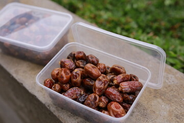 Dried dates in plastic box