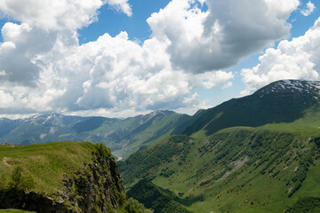 the landscape of mountains in Georgia.Snow-capped mountain peaks against a blue sky
