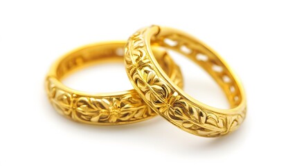 A pair of gold hoop earrings, isolated on a white background