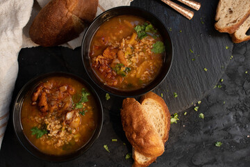 Vegan soup in black bowl
