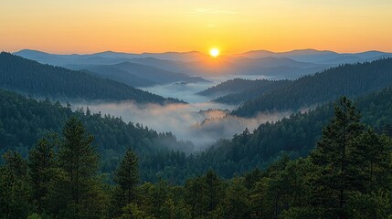 Obraz premium A serene sunrise over misty mountains and lush forests, capturing nature's tranquility.