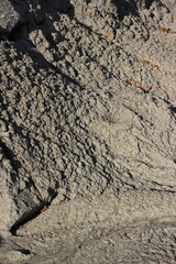 unfinished concrete dries as it falls on the ground