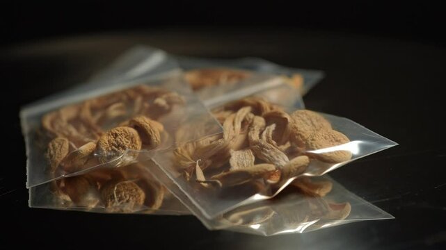 Psilocybin psychedelic magic mushrooms. Magic shrooms macro close up, micro-dosing concept, alternative medical therapy and treatment with natural remedies. Psychoactive hallucination dried mushroom.