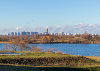 Shot of the modern city on the bank of the river. Urban