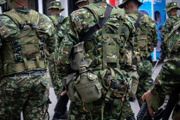 Colombian army patrolling the streets, military forces on urban patrol in Colombia, soldiers...