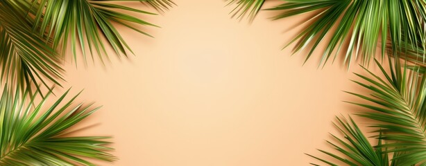 Tropical leaves frame. Green color tropics foliage on Peach fuzz solid background. Empty space in the center for product presentation. Flat lay, top view, copy space. Summer concept, minimalists style