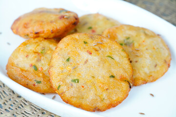Aloo ki kachori, potato stuffed kachori with ketchup. Famous indian food