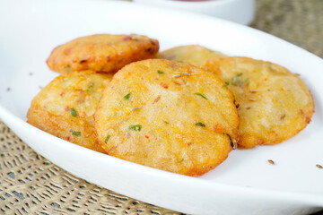 Aloo ki kachori, potato stuffed kachori with ketchup. Famous indian food