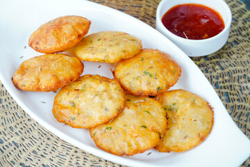 Aloo ki kachori, potato stuffed kachori with ketchup. Famous indian food