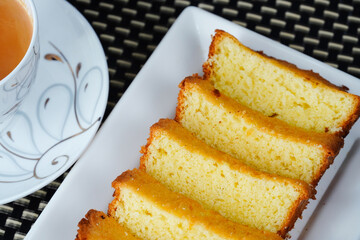 Home made cake in white tray. Soft and delicious cake