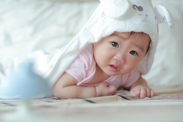 Cute little boy with bunny hat.