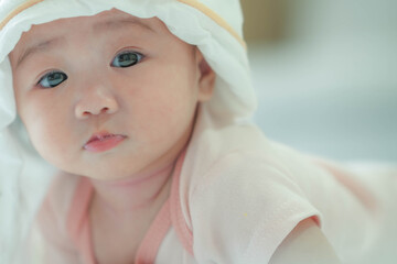 Cute little boy with bunny hat.