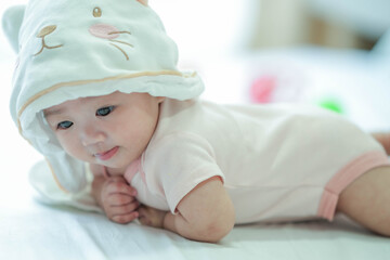 Cute little boy with bunny hat.