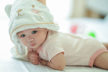 Cute little boy with bunny hat.