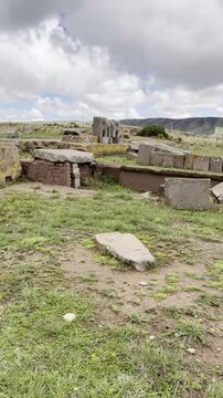TIWANAKU, BOLIVIA - Pumapunku or Puma Punku, Gate of the Puma man-made terraced platform mound the ruins of the monumental complex