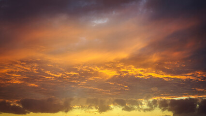 Dramatic red, orange, and yellow real fiery sky at sunset. Suitable for sky replacement, background or graphic design