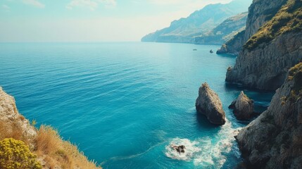 Beautiful coastal view showing cliffs and clear blue waters under a bright sky