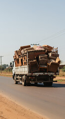 Overloaded! Truck Hauling Furniture - Unsafe Load, Moving Day, Africa Road, Odd Sight, Heavily Loaded Vehicle