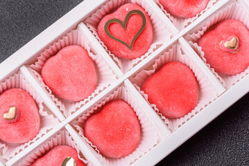 Delicious sweet mochi in the shape of red hearts