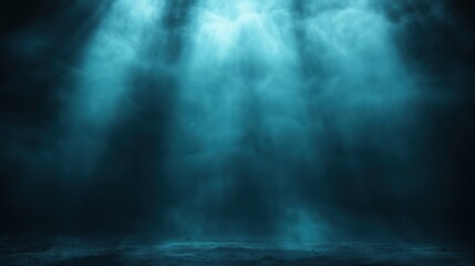 Mysterious teal light beams shining through atmospheric underwater mist